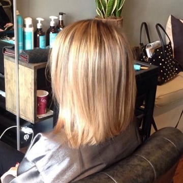 Ash blonde high light with A-line blunt haircut done by Kelly