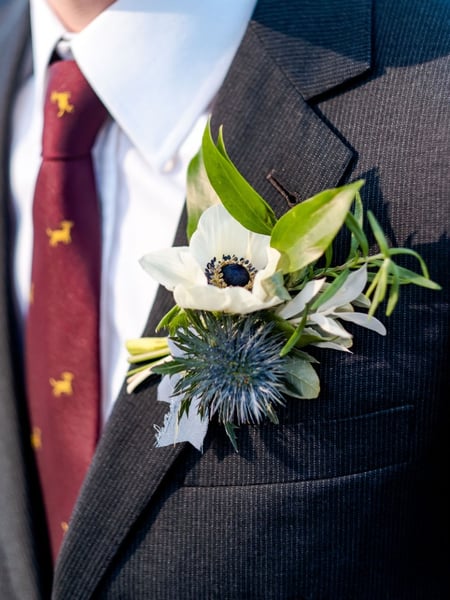 Image of  Florist, Arrangement Type, Boutonniere, Occasion, Wedding, Wedding Ceremony, Size & Display, Small, Color, White, Blue, Green, Flower Type, Anemone, Thistle