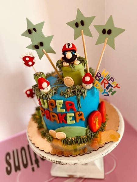 Image of  Cakes, Color, Brown, Green, Icing Type, Buttercream, Fondant, Shape, Round, Theme, Character