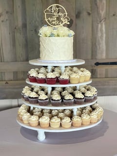 View Buttercream, Occasion, Cakes, Wedding Cake, Color, Yellow, Icing Type, Buttercream, Shape, Round, Theme, Floral, Cupcakes, Occasion, Wedding, Color, White, Icing Type - Tara Simmons, Cleveland, TN