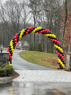 View Balloon Decor, Arrangement Type, Balloon Arch, Event Type, Graduation, Holiday, Corporate Event, Colors, Black, Yellow, Red - Amy DesChenes, Swampscott, MA