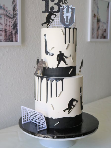 Image of  Cakes, Color, Black, White, Icing Type, Buttercream, Shape, Tiered, Round, Theme, Sports