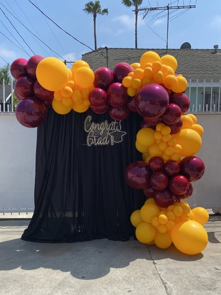 Image of  Balloon Decor, Arrangement Type, Balloon Composition, Balloon Garland, Balloon Arch, Event Type, Graduation, Colors, Black, Yellow, Red, Accents, Lighted Signs, Balloon Column