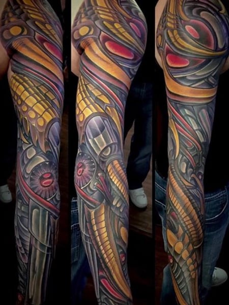 Image of  Tattoos, Tattoo Bodypart, Tattoo Colors, Shoulder, Arm , Forearm , Wrist , Black , Gold, Red